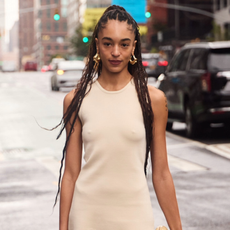 woman wearing tan dress in new york city