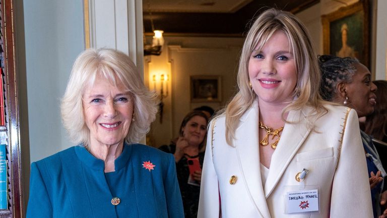  Camilla, Duchess of Cornwall and President of Women of the World Festival (L), meets actor Emerald Fennell, who portrayed the Duchess in the television series 'The Crown', during a reception to mark International Women's Day at Clarence House, in London, on March 8, 2022. 
