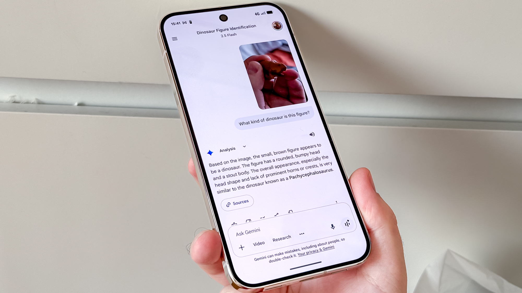 Google Pixel 10 Pro XL Gemini query about dinosaur figure