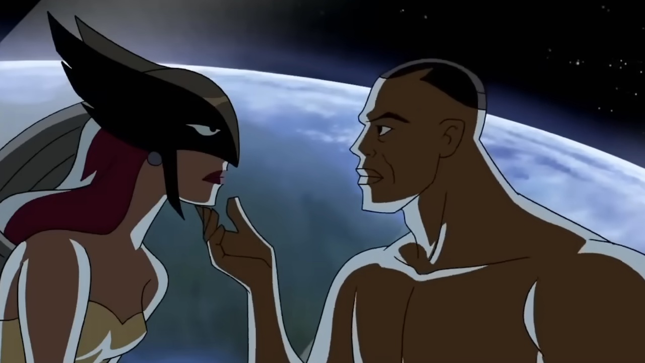 Hawkgirl and a shirtless Green Lantern prepare to kiss in Justice League