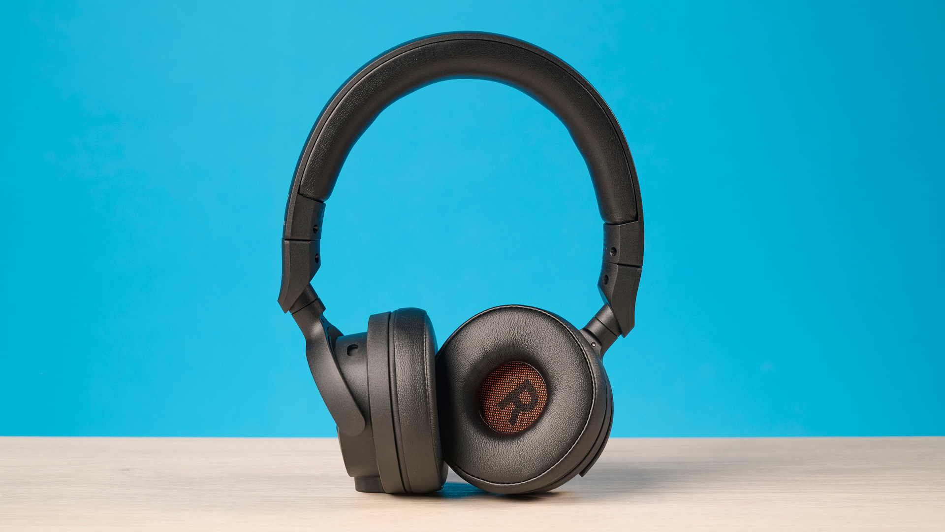 Beyerdynamic DT 275 Pro photographed in front of a blue background