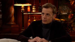 Trevor St. John as Tucker smirking in The Young and the Restless