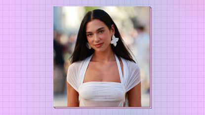  Dua Lipa wearing a white dress attends the wedding Of Simon Porte Jacquemus And Marco Maestri on August 27, 2022 in Charleval, France. on a purple and blue background