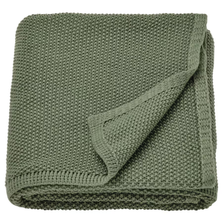 A green throw blanket
