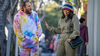 Jonah Hill and Lauren London as Ezra and Amira laughing and talking in You People