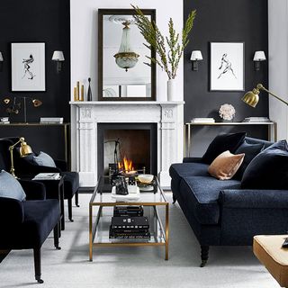 living room with grey sofa and fire place