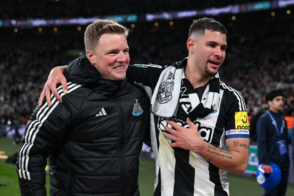 Newcastle United Head Coach Eddie Howe embraces Bruno Guimaraes of Newcastle United (39) following the Carabao Cup Final between Liverpool and Newcastle United at Wembley Stadium on March 16, 2025 in London, England