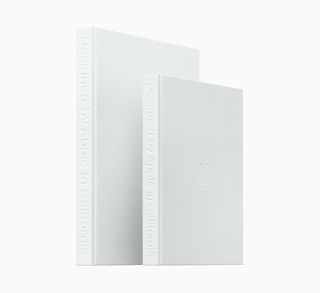The books have a subtle design that ties into the Apple brand