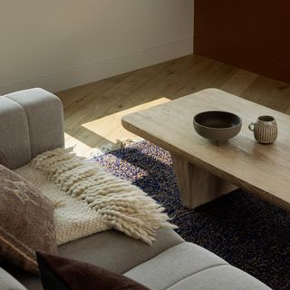 A living room with coffee table and layered textures
