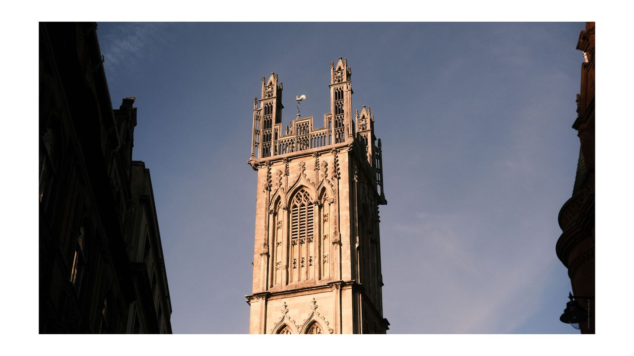 A photo of old buildings in Bristol, with blue skies, taken on the Fujifilm X-E4