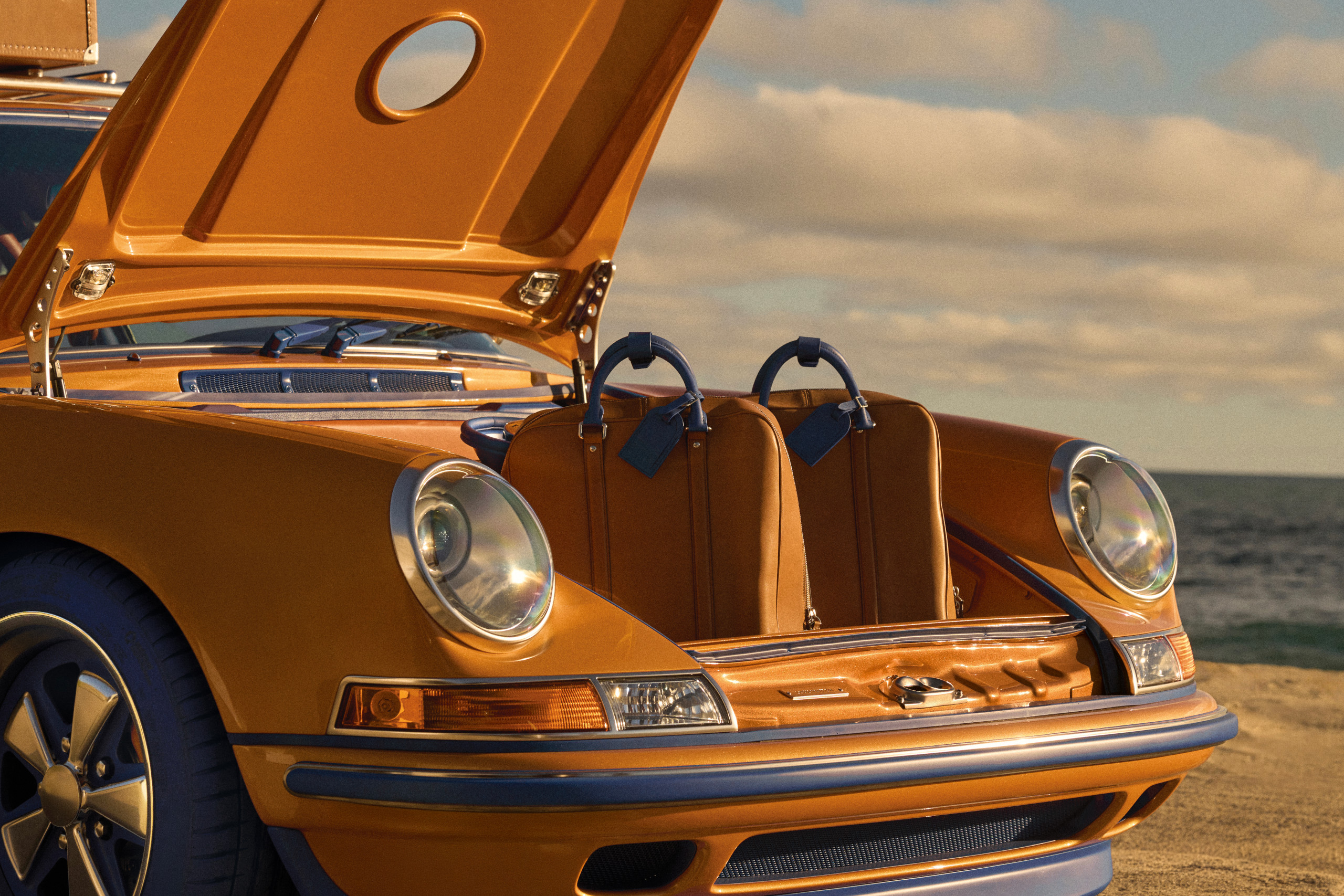 Bespoke fitted luggage fits in the Classic's forward luggage compartment