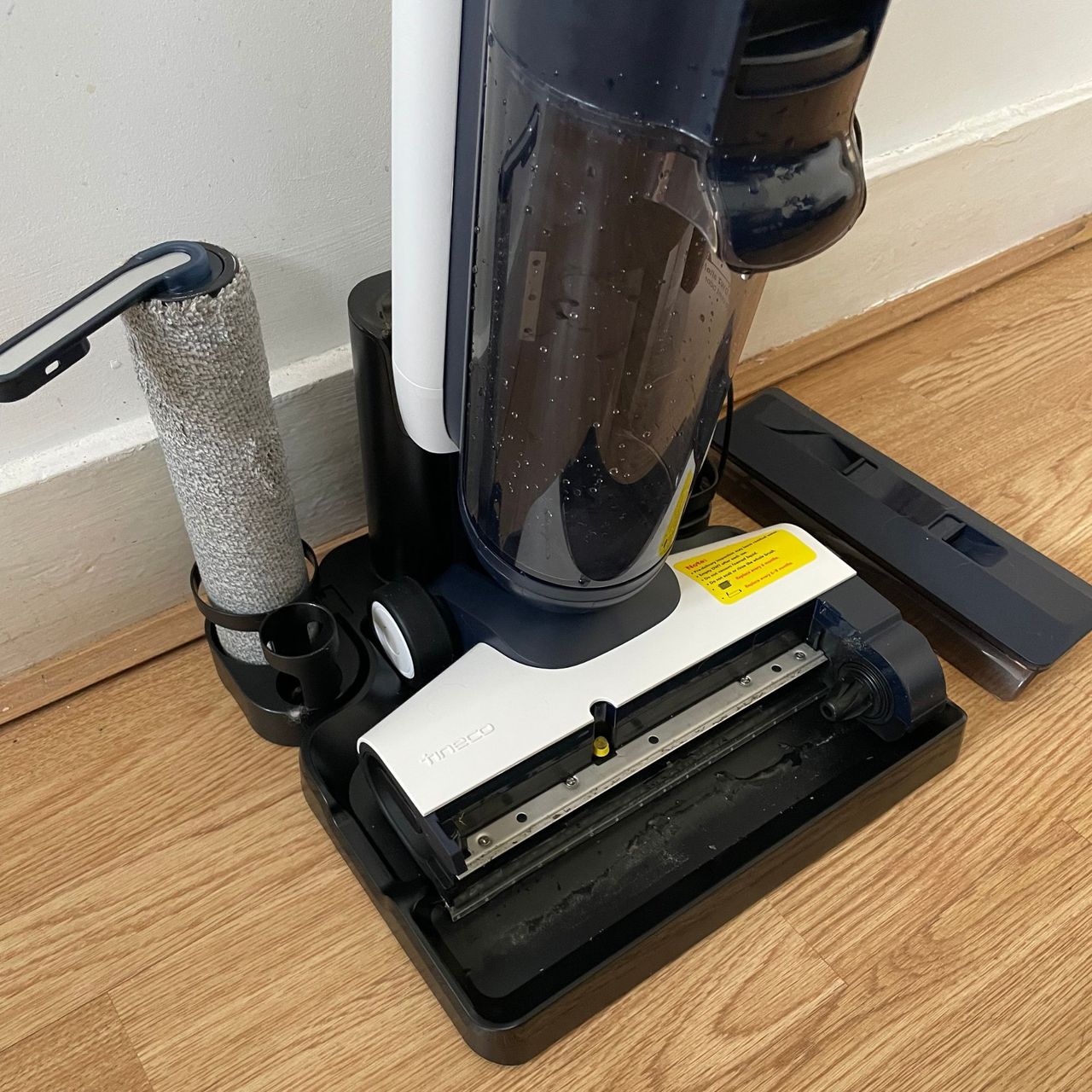 Tineco Smart Mop on charge with the roller removed