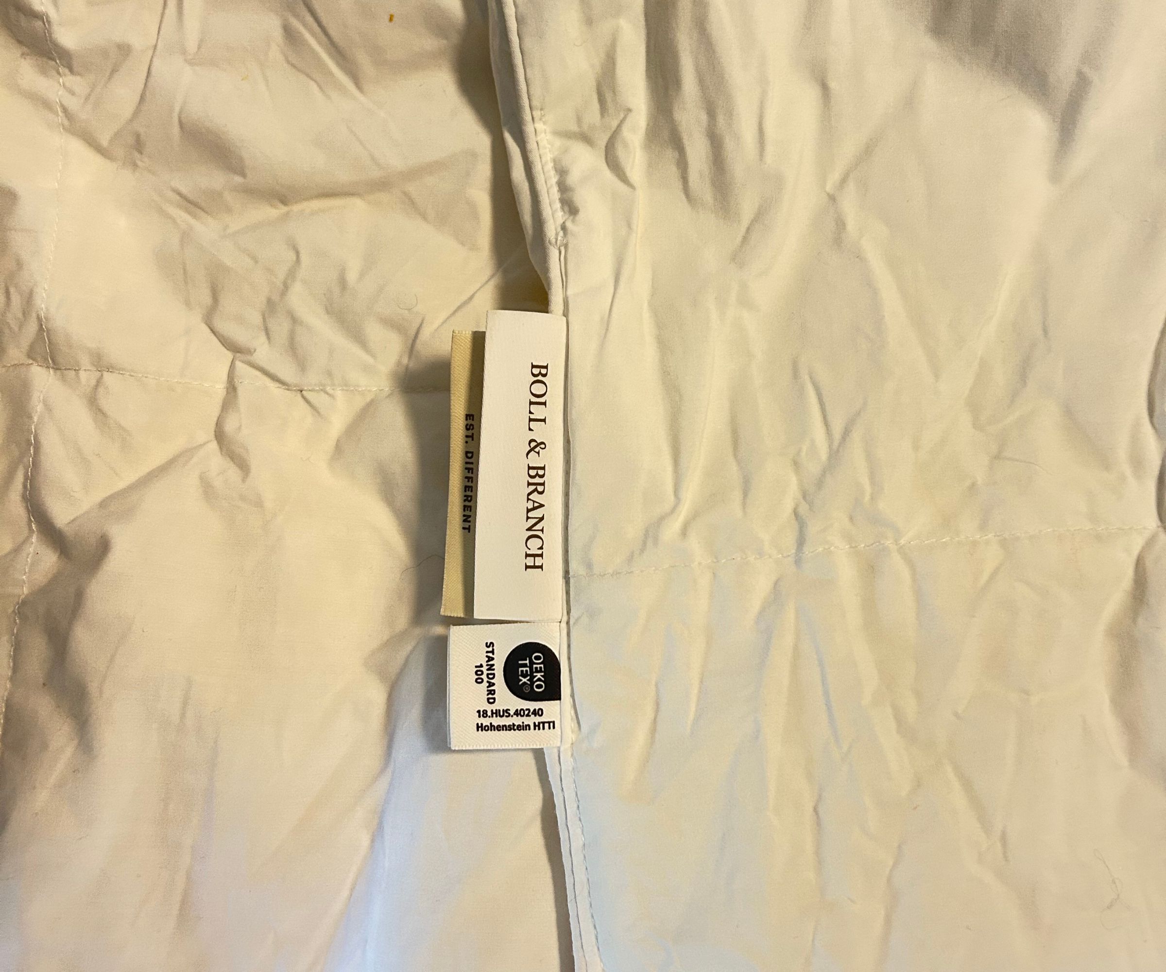 Close up of a duvet insert showing labels