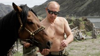 Putin poses with a horse during a holiday in Southern Siberia in 2009