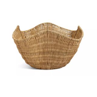 Rattan wave storage basket from Habitat on a white background