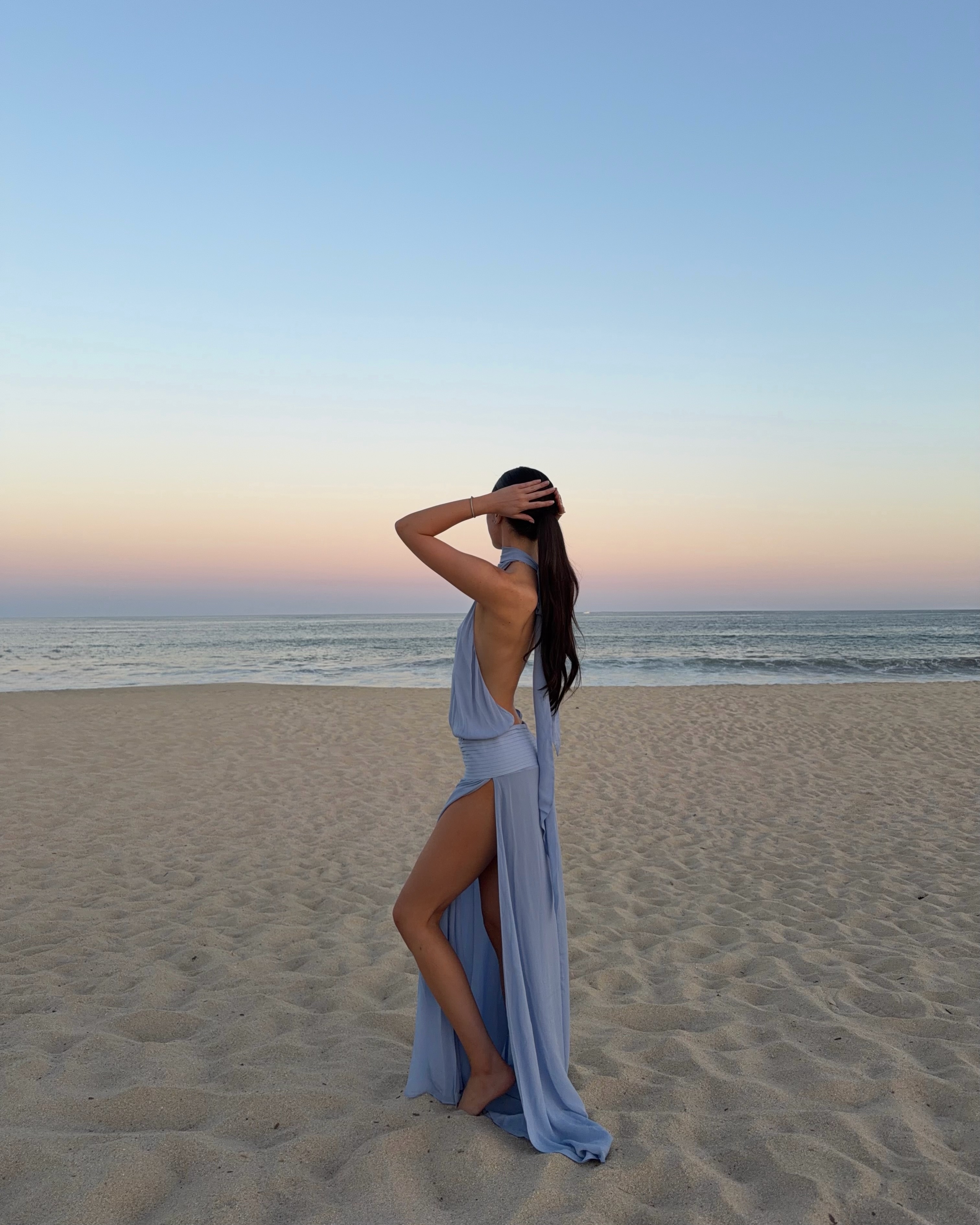 An image of a woman wearing best backless dress summer 2026