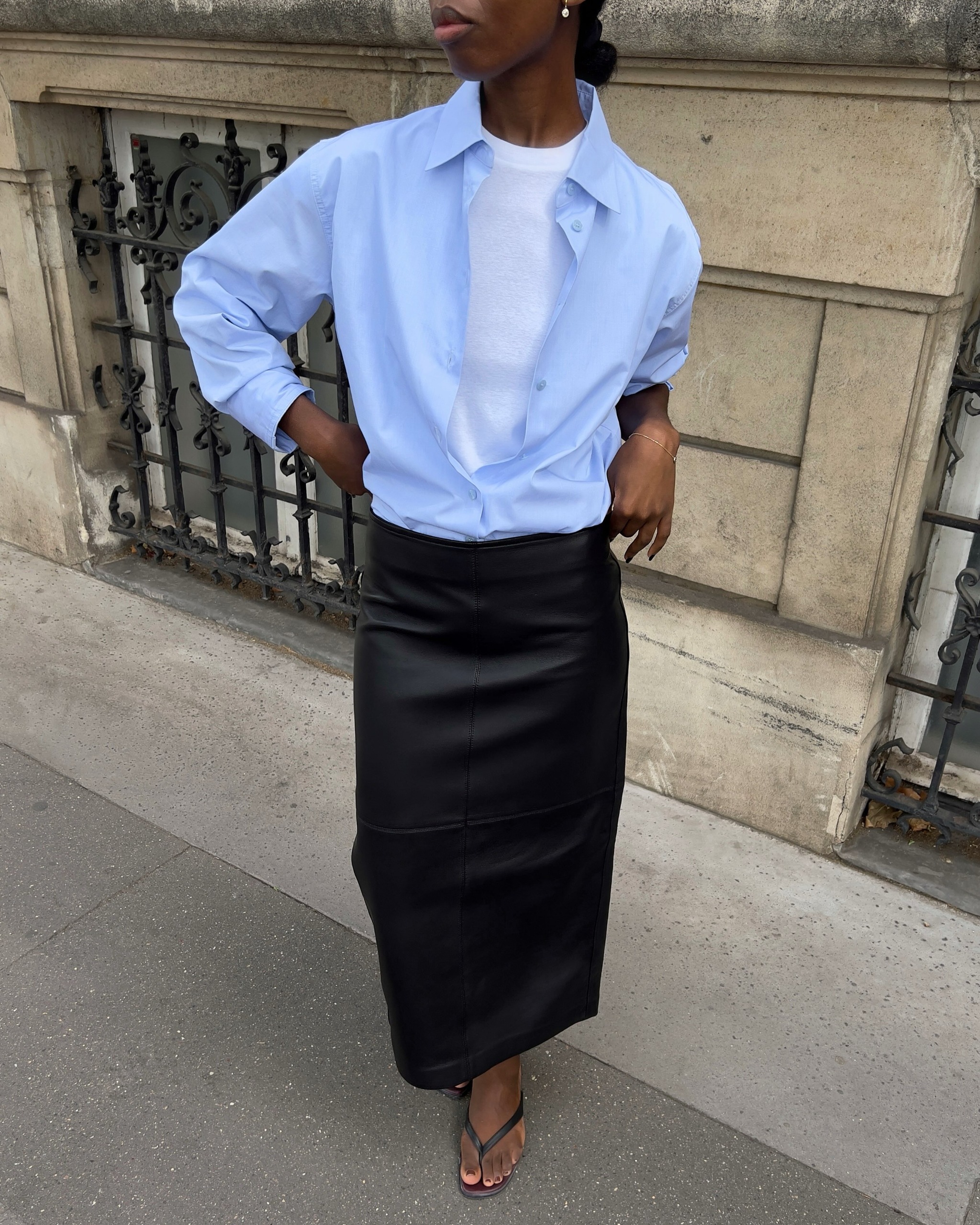 @sylviemus_ wearing A.L.C skirt and button-down