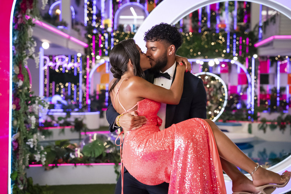 Bryan Arenales carries Amaya Espinal as they kiss, in the 'Love Island USA' season 7 finale.