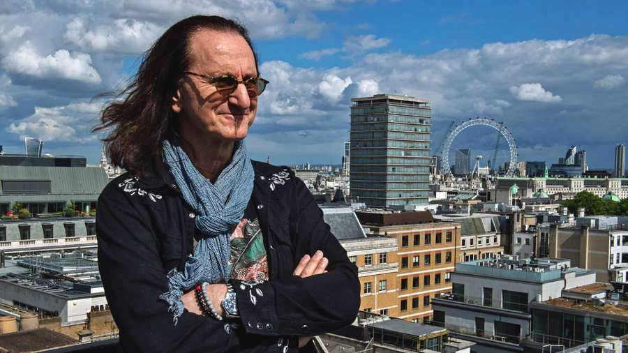 Geddy Lee on a balcony overlooking London