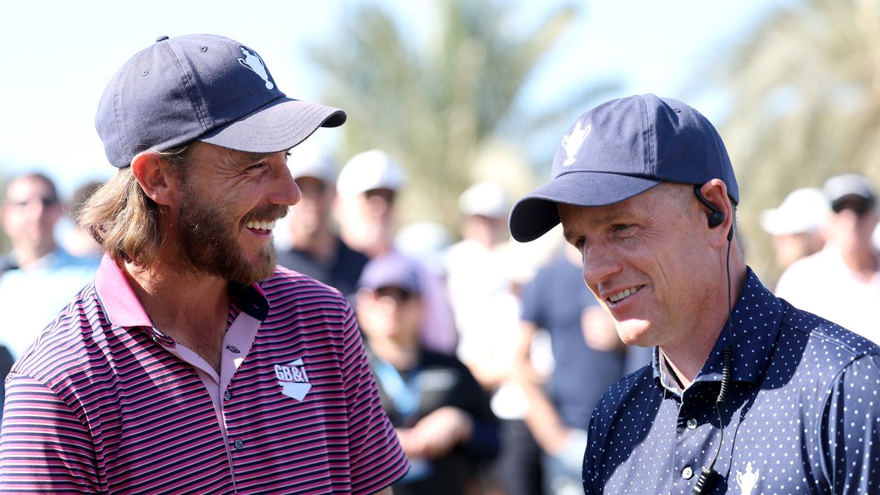 Tommy Fleetwood (left) and Luke Donald share a laugh at the 2025 Team Cup