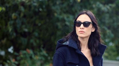 alexa chung wearing a navy coat
