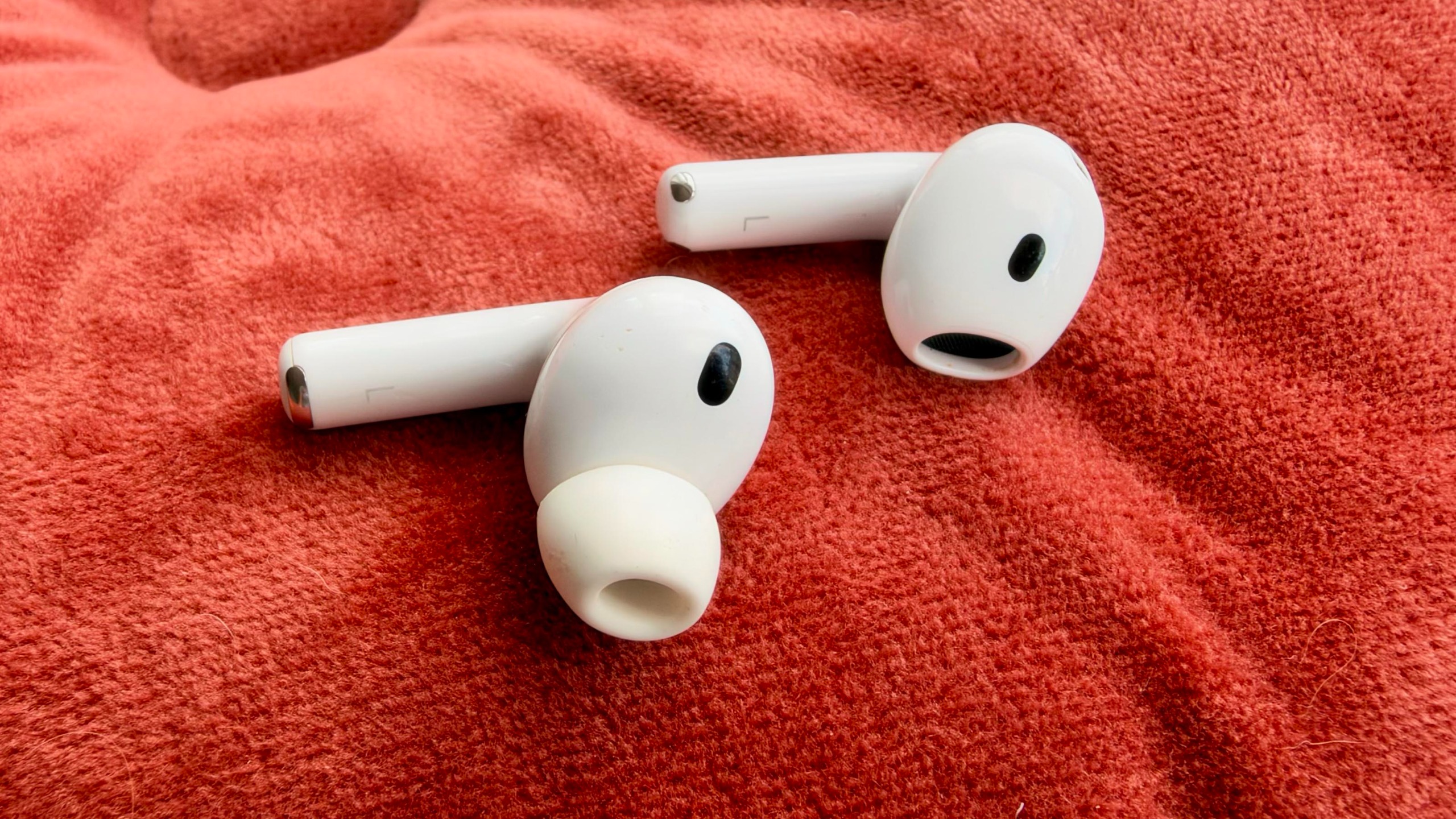 A photo of the AirPods 5 and AirPods Pro 3