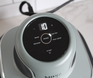 The control panel on the Ninja Crispi Portable Glass Air Fryer