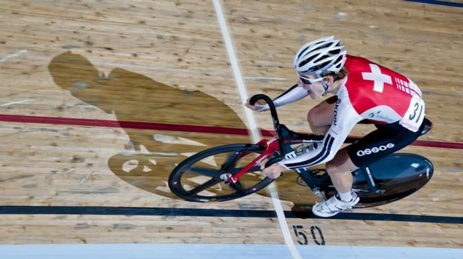 Oliver Beer (Switzerland) takes an impressive solo effort to win the Omnium Scratch