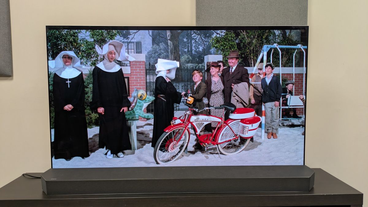 Shot of Pee-wee's Big Adventure 4K Blu-ray depicting group of nuns by red bike, shown on LG G5 screen