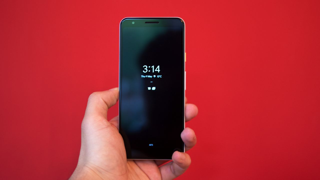 Google Pixel 3a on red backdrop