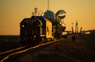 Train Rolls Out Soyuz Rocket