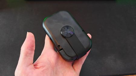 The folded up Razer Prio in a reviewer's hand