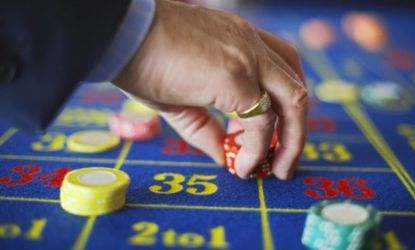 Gambling addicts may actually have a chemical imbalance in their brain that makes them less sensitive to the pain of monetary loss, according to new research.