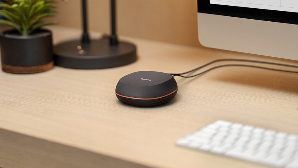 SanDisk Desk Drive on a desktop and connected to an iMac
