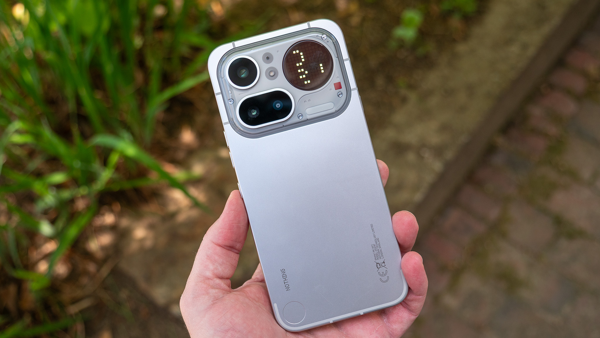 The back of the silver Nothing Phone 4a Pro