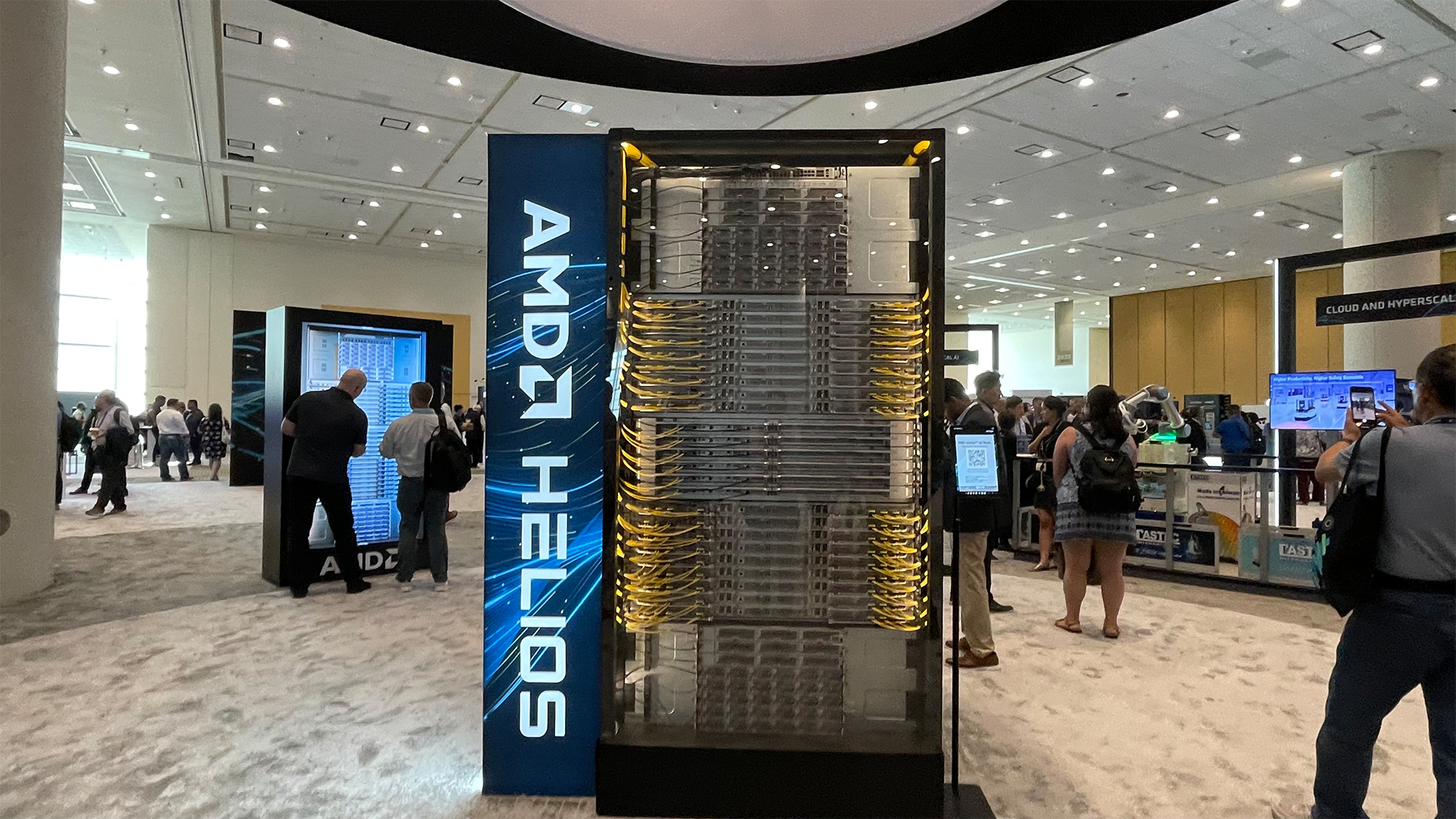 AMD Helios rack system pictured in the exhibitor hall at AMD Advancing AI 2026, hosted at the Moscone Center, San Francisco.
