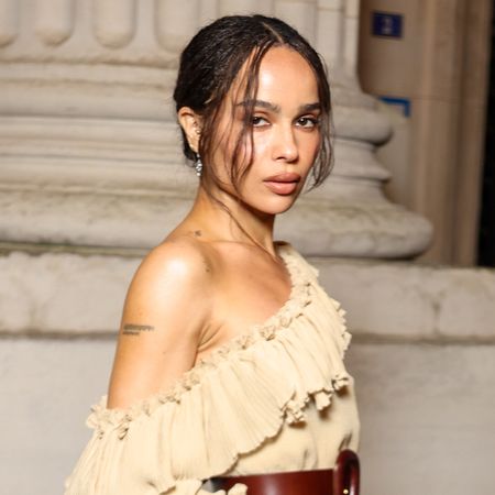 Zoe Kravitz wearing a boho dress to the Saint Laurent show in Paris