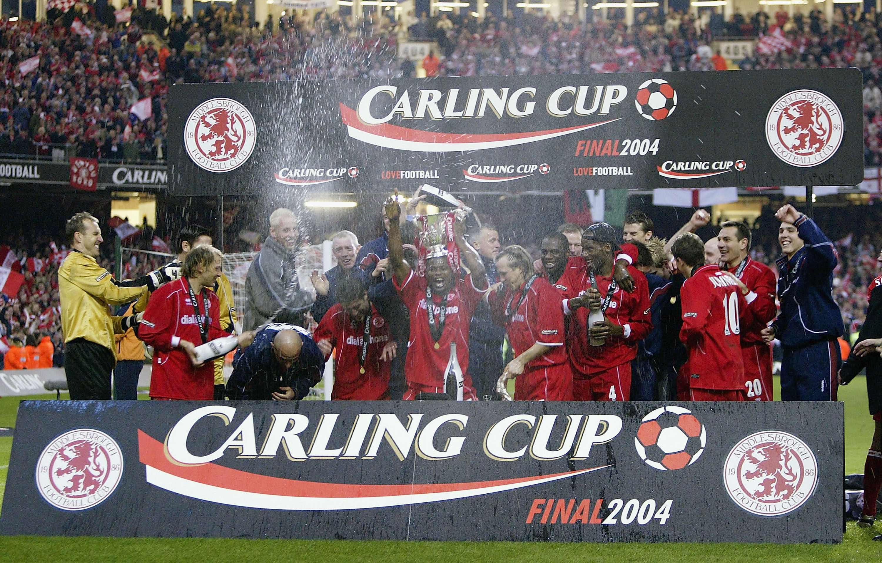 CARDIFF, WALES - FEBRUARY 29:  The Middlesbrough team celebrate with the Carling Cup after their victory over Bolton Wanderers in the Carling Cup Final match between Bolton Wanderers and Middlesbrough at The Millennium Stadium on February 29, 2004 in Cardiff, Wales.  (Photo by Clive Brunskill/Getty Images)