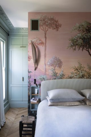 Pink and blue bedroom with floral wallpaper