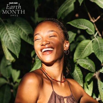 Woman in the sunlight with leaves