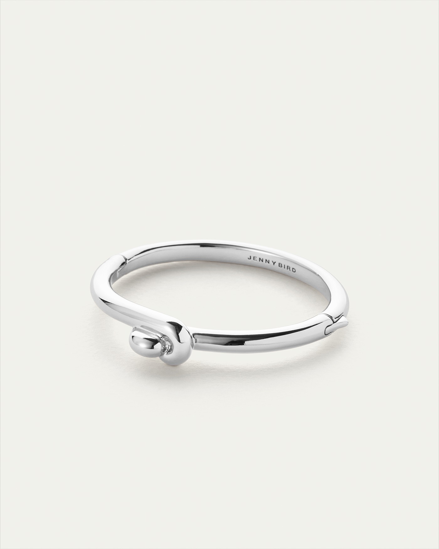 silver bangle with knot detail