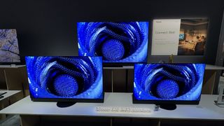 Panasonic Z95B in all three available sizes with an abstract blue sphere on screen