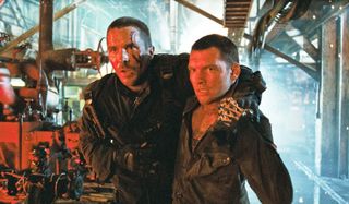 Terminator Salvation Sam Worthington helps Christian Bale around the factory