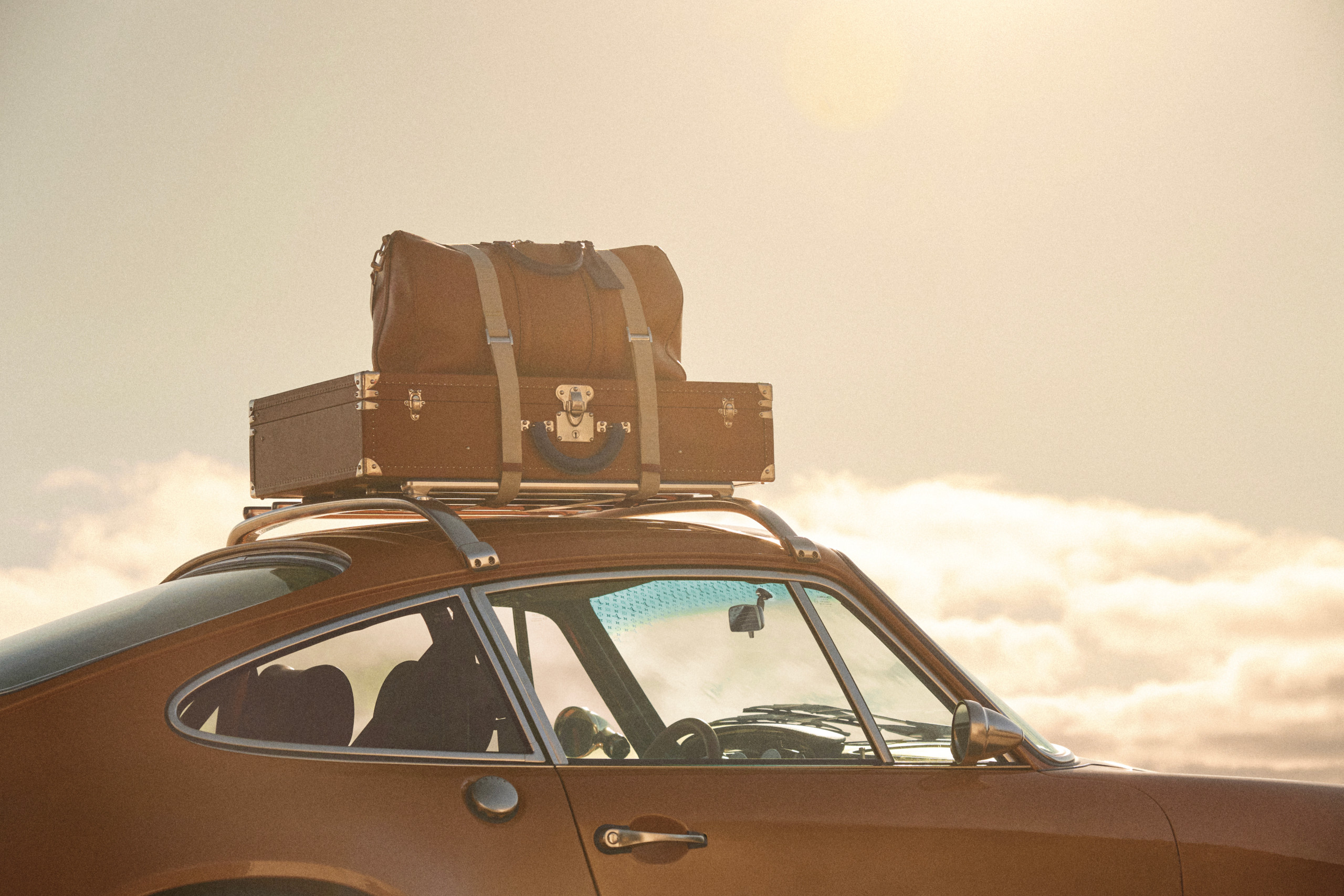 The Classic includes a bespoke roof rack for trunks, surfboard or skis
