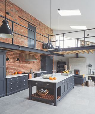 large kitchen extension to brick barn with mezzanine space