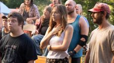 (L-R) Zack Gottsagen as Zak, Dakota Johnson as Eleanor and Shia LaBeouf as Tyler in "The Peanut Butter Falcon" now streaming on Netflix