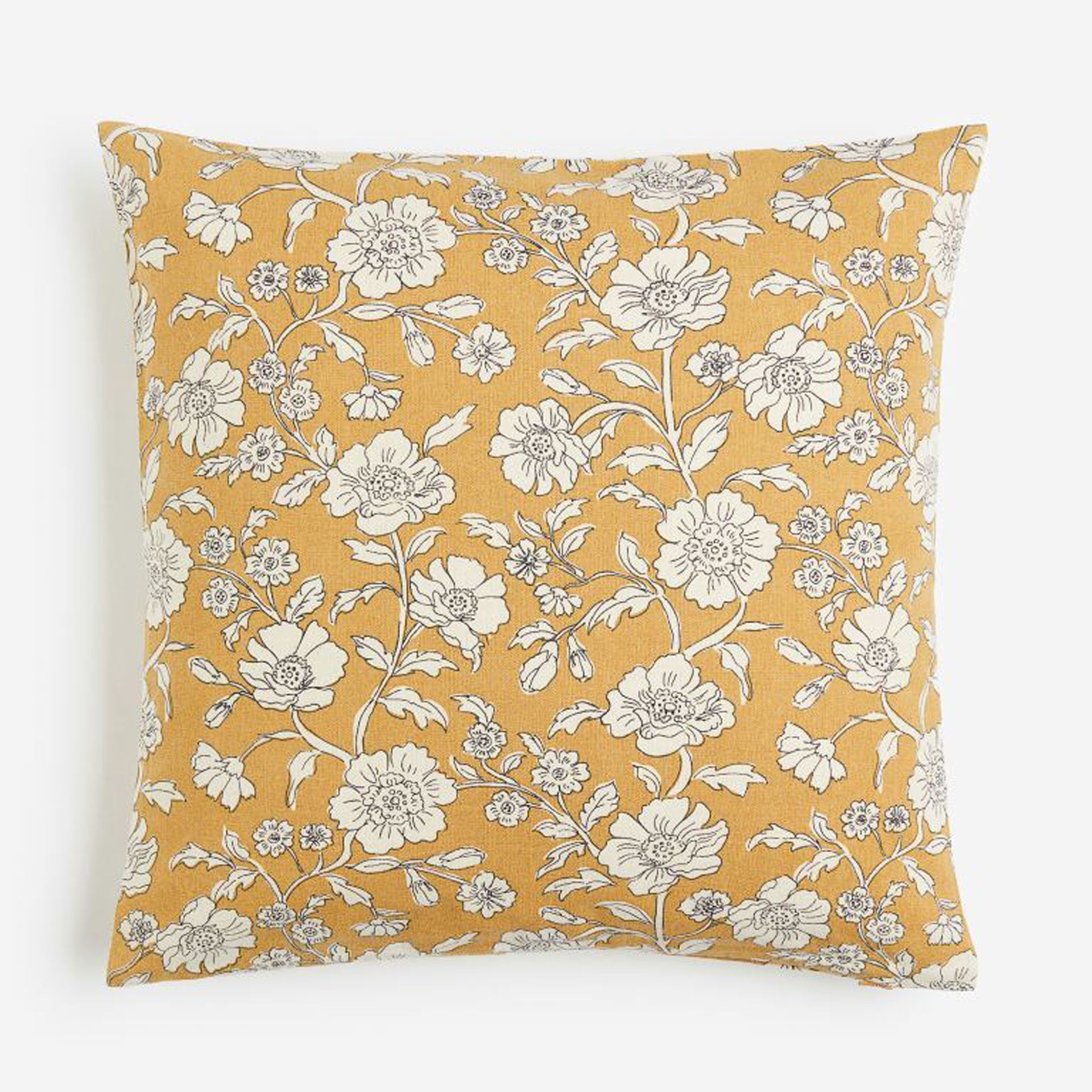 Bantal cantik dengan motif bunga berwarna kuning madu