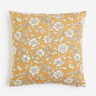 Pretty floral print cushion in honey yellow