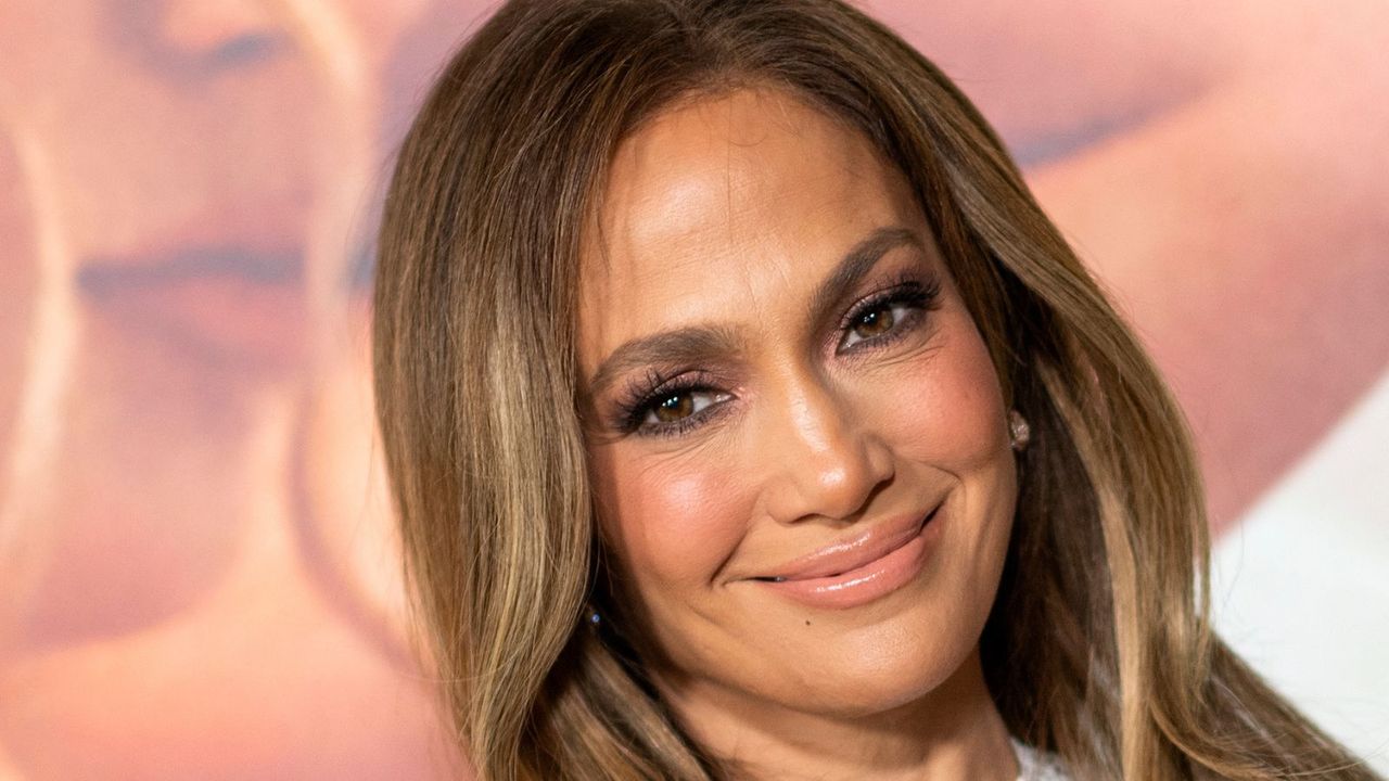 jennifer lopez on a beige background