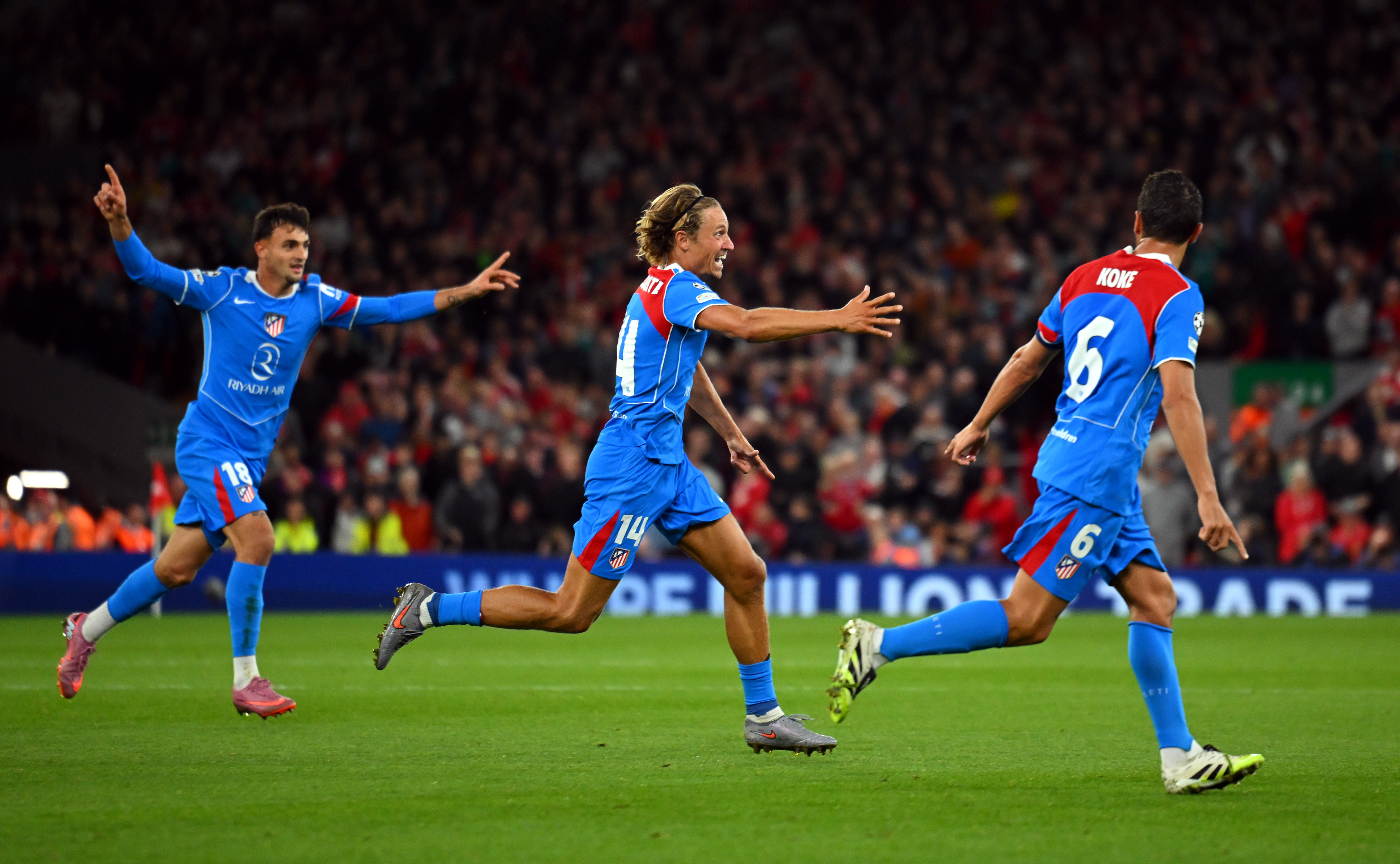 Marcos Llorente of Atletico de Madrid celebrates scoring his team&#039;s second goal with teammates during the UEFA Champions League 2025/26 League Phase MD1 match between Liverpool FC and Atletico de Madrid at Anfield on September 17, 2025 in Liverpool, England.